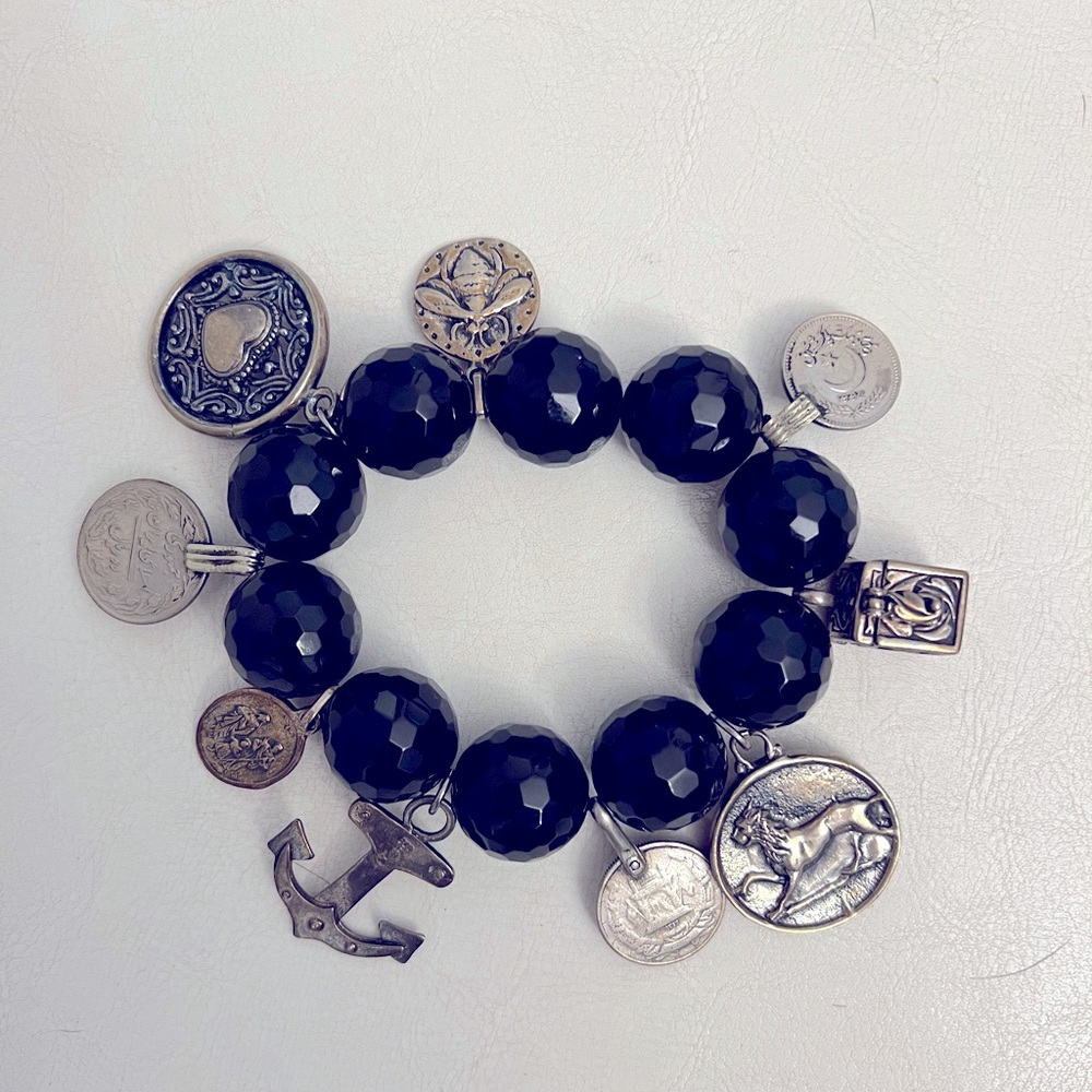 J. Lands original design onyx stretch bracelet with 8 sterling charms!